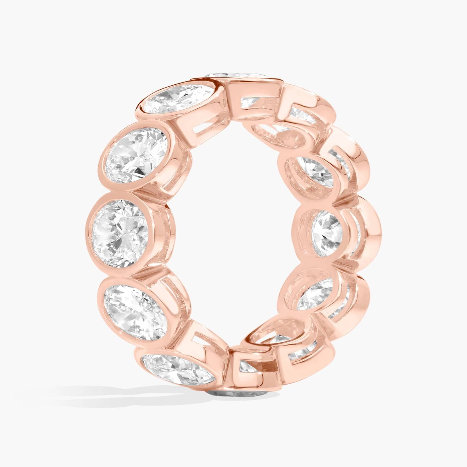 Bezel Eternity Ring With 7 CTW Oval Cut Diamonds in 14K Rose Gold (7.5mm)