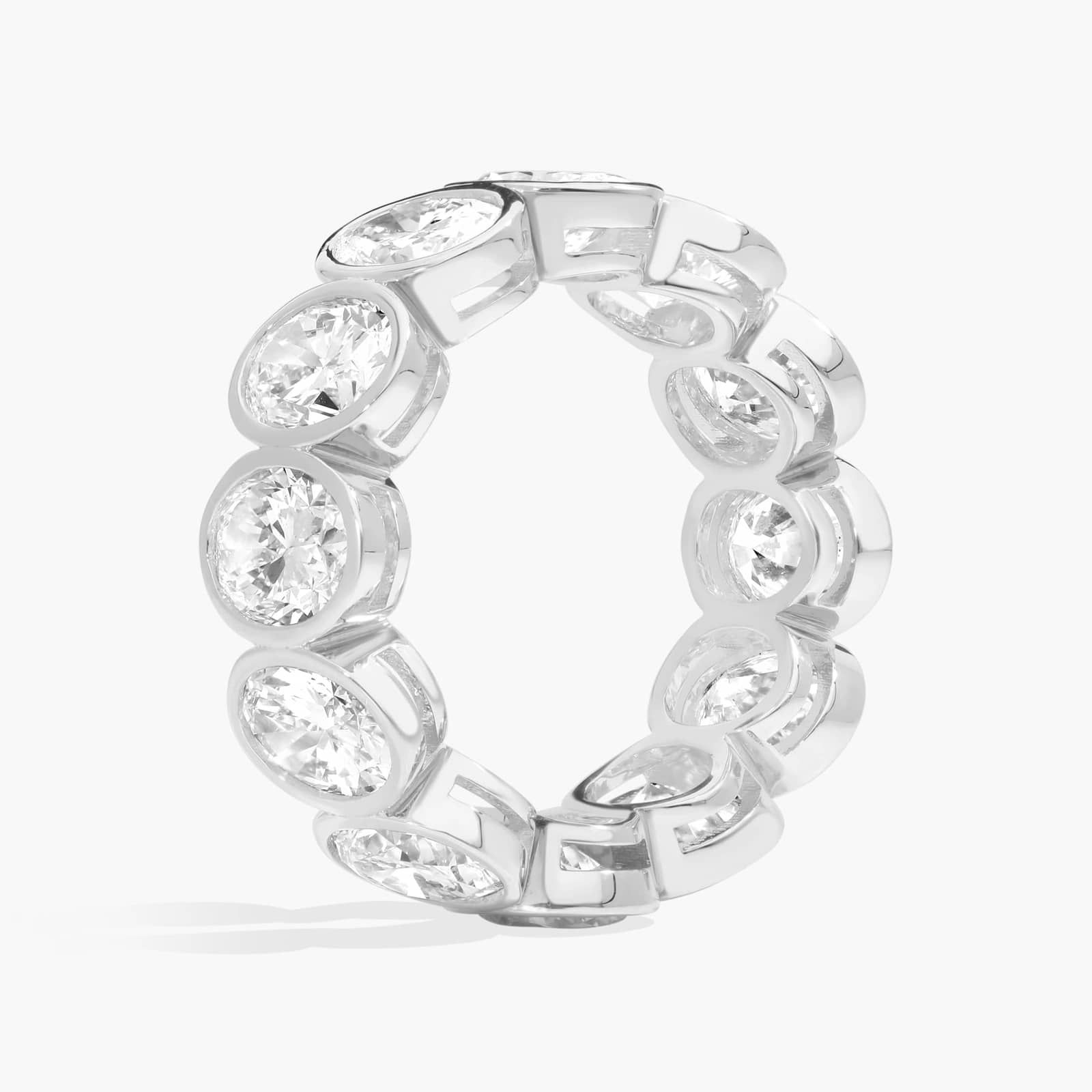 Bezel Eternity Ring With 7 CTW Oval Cut Diamonds in 14K White Gold (7.5mm)