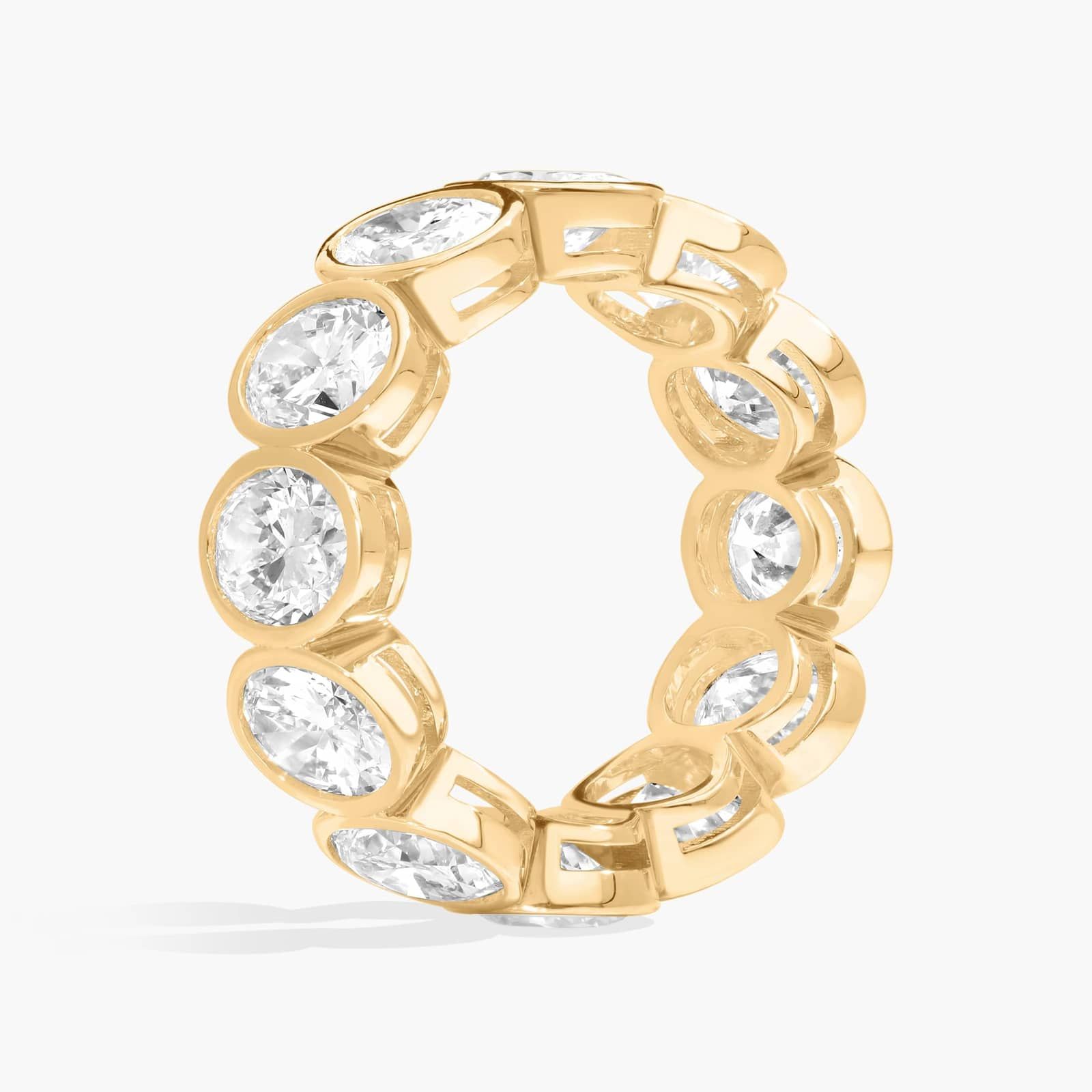 Bezel Eternity Ring With 7 CTW Oval Cut Diamonds in 14K Yellow Gold (7.5mm)
