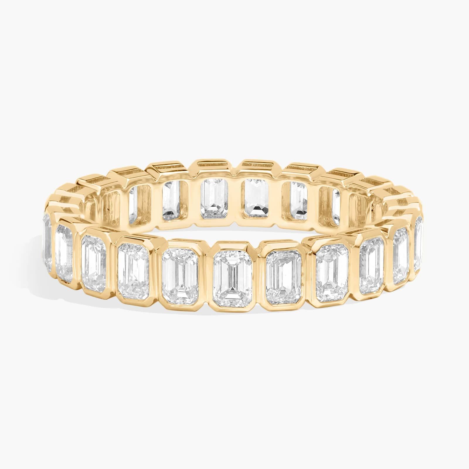 Bezel Eternity Ring With 2 CTW Emerald Cut Diamonds in 14K Yellow Gold (3.5mm)