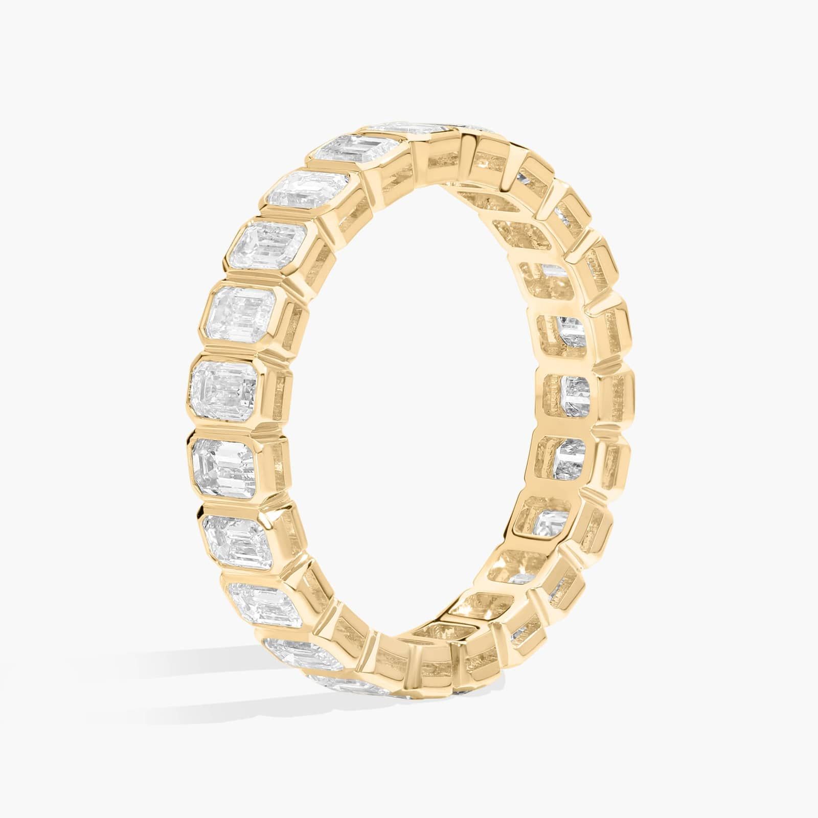 Bezel Eternity Ring With 2 CTW Emerald Cut Diamonds in 14K Yellow Gold (3.5mm)