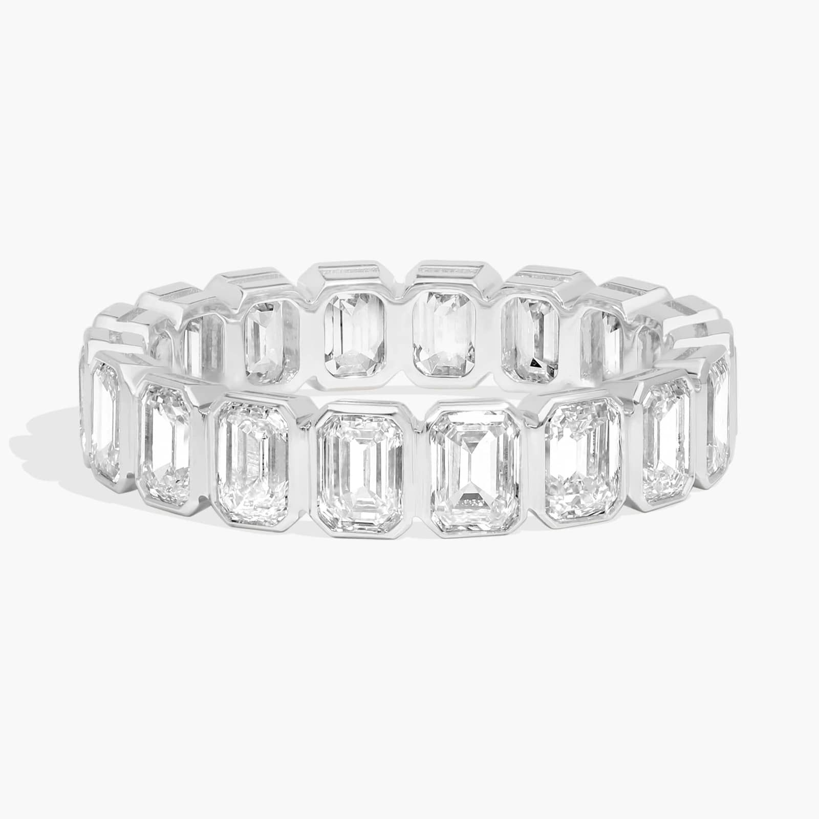 Bezel Eternity Ring With 3 CTW Emerald Cut Diamonds in Platinum (4.2mm)
