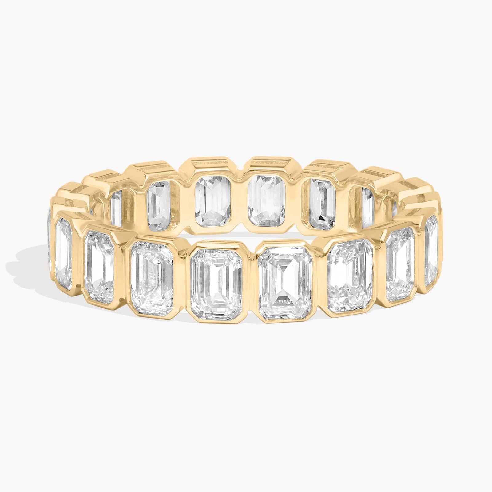 Bezel Eternity Ring With 3 CTW Emerald Cut Diamonds in 14K Yellow Gold (4.2mm)
