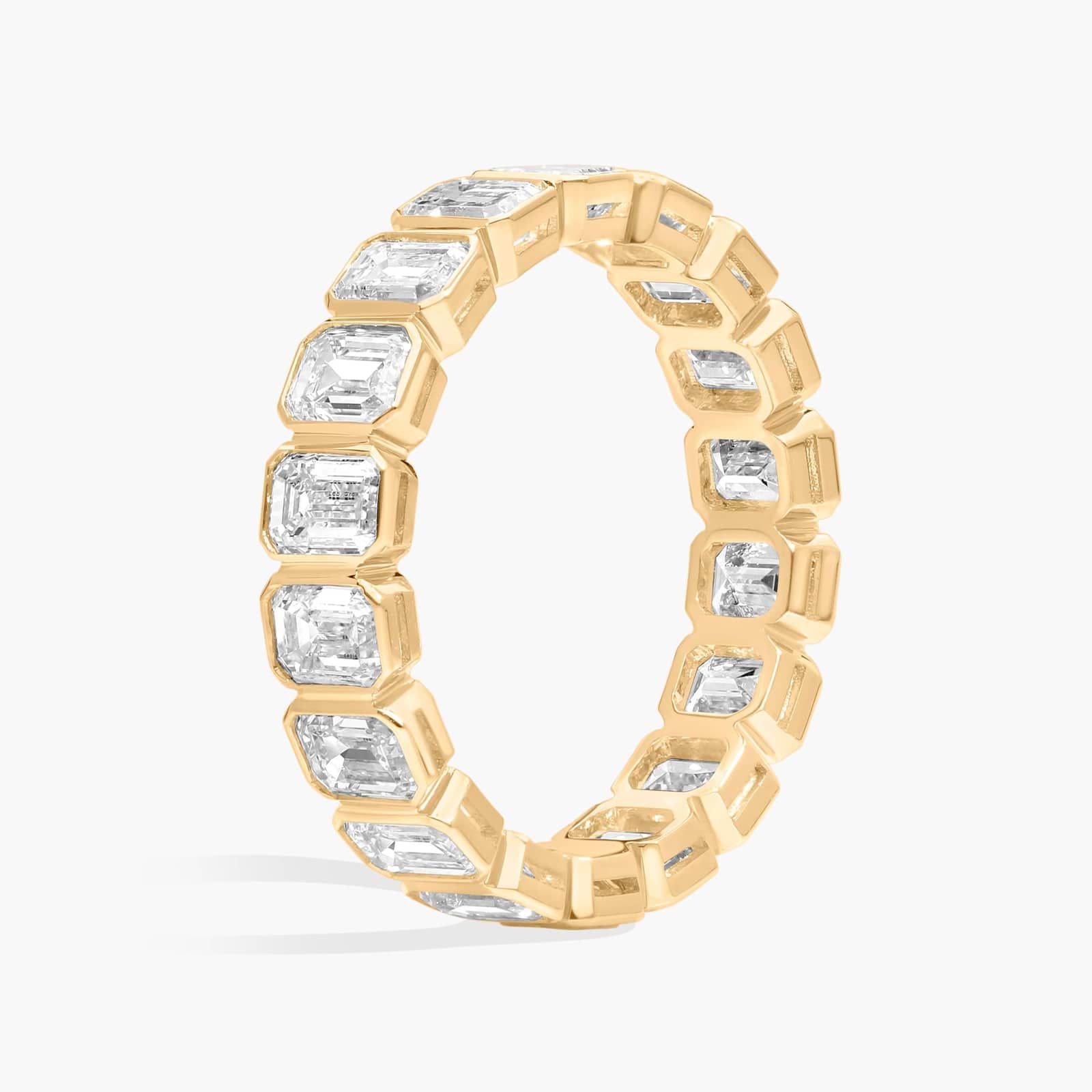 Bezel Eternity Ring With 3 CTW Emerald Cut Diamonds in 14K Yellow Gold (4.2mm)
