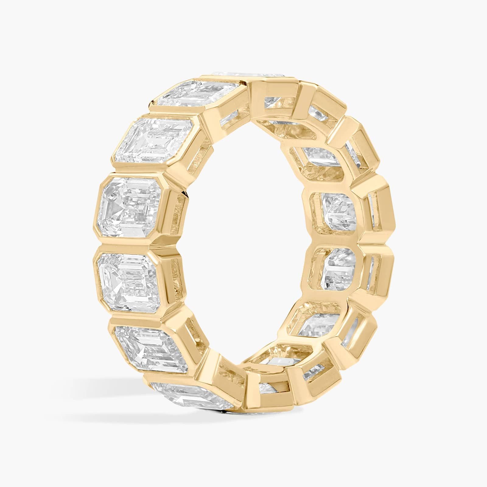Bezel Eternity Ring With 7 CTW Emerald Cut Diamonds in 14K Yellow Gold (6.3mm)