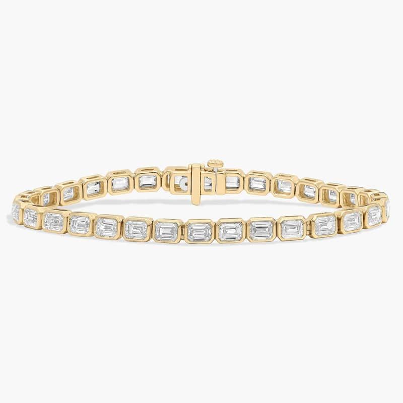 7 " Emerald Cut Lab Grown Diamond  E/W Bezel Set Tennis Bracelet In 14K Yellow Gold (8 Ct. tw. - F-G / VS2-SI1)