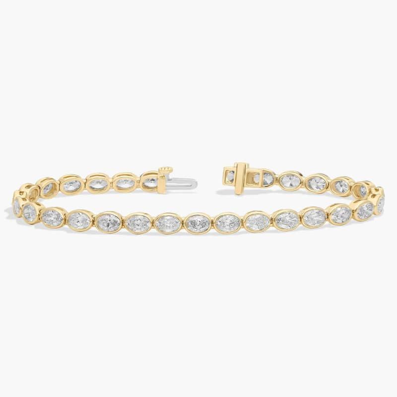 7 " Oval Cut Lab Grown Diamond  E/W  Bezel Set Tennis Bracelet In 14K Yellow Gold (8 Ct. tw. - F-G / VS2-SI1)