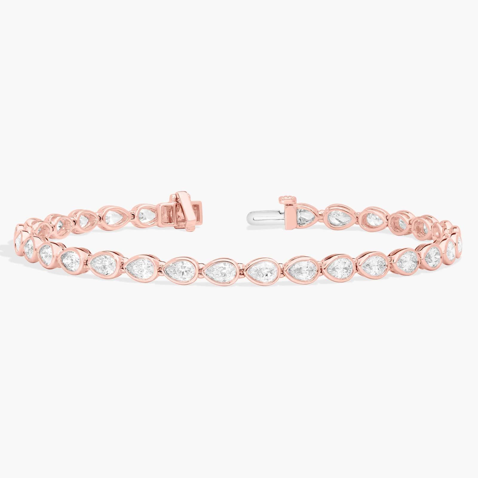 East-West Bezel Tennis Bracelet With 5 CTW Pear Shaped Diamonds in 14K Rose Gold