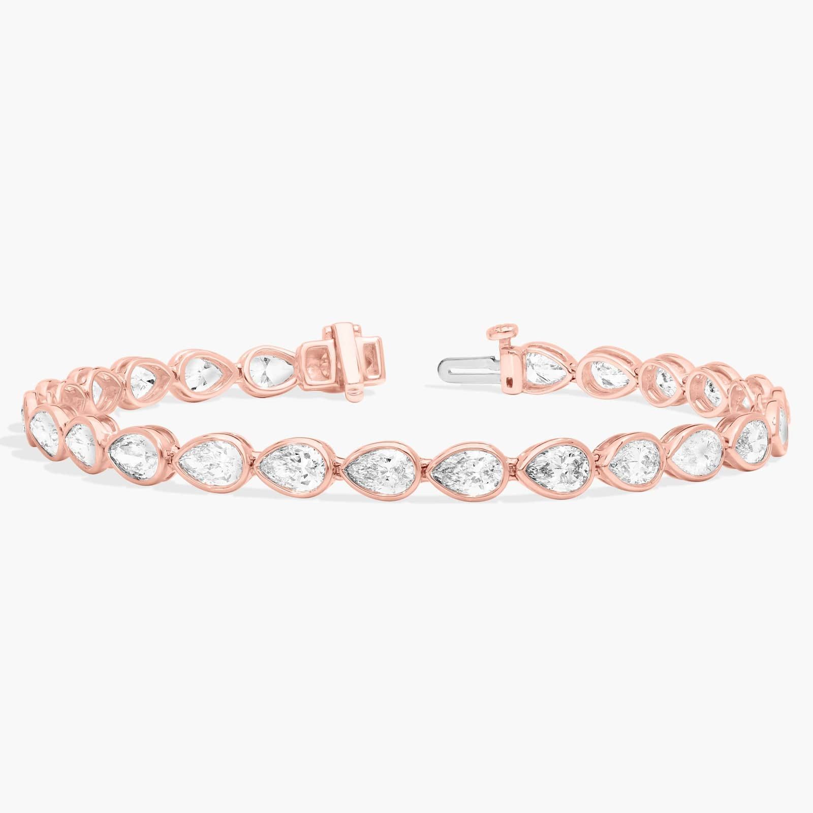 East-West Bezel Tennis Bracelet With 8 CTW Pear Shaped Diamonds in 14K Rose Gold