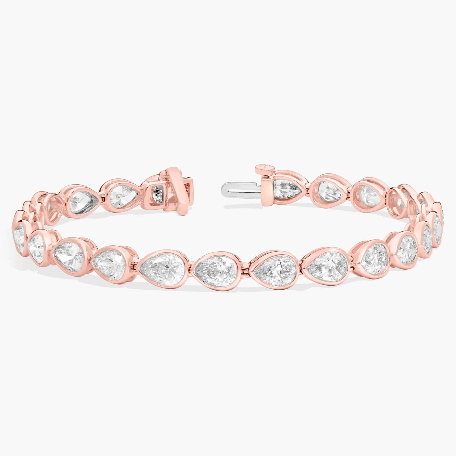 East-West Bezel Tennis Bracelet With 10 CTW Pear Shaped Diamonds in 14K Rose Gold
