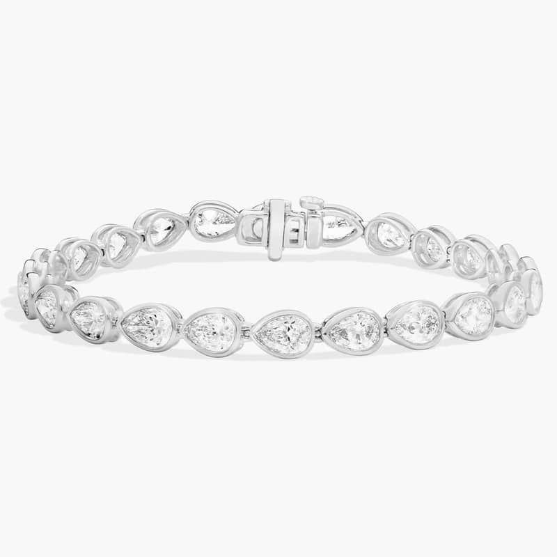 East-West Bezel Tennis Bracelet With 10 CTW Pear Shaped Diamonds in 14K White Gold
