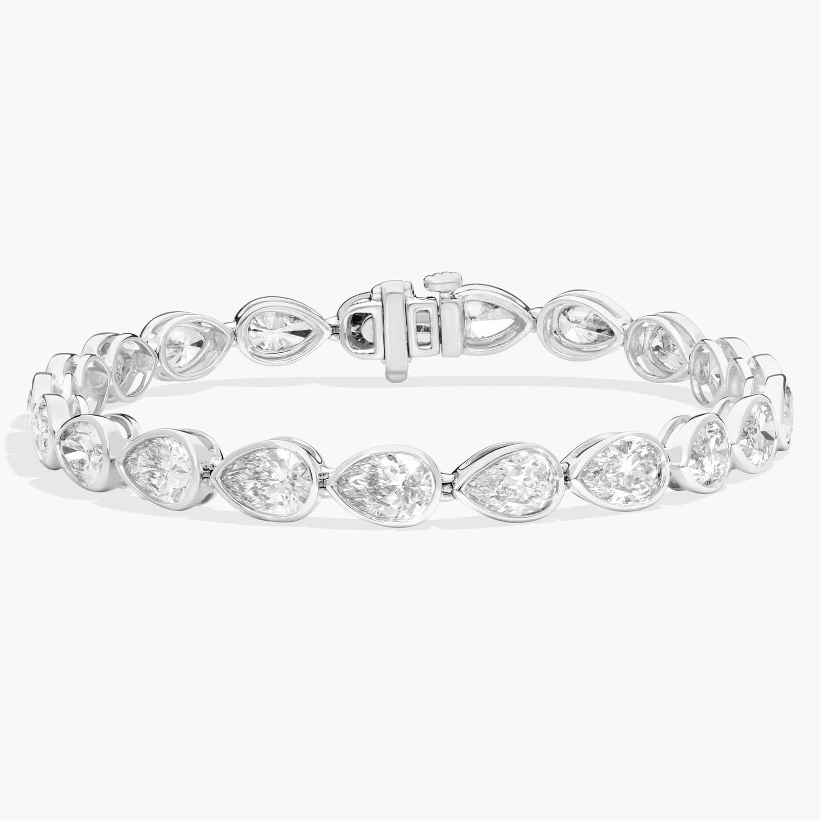 East-West Bezel Tennis Bracelet With 12 CTW Pear Shaped Lab-Grown Diamonds in 14K White Gold
