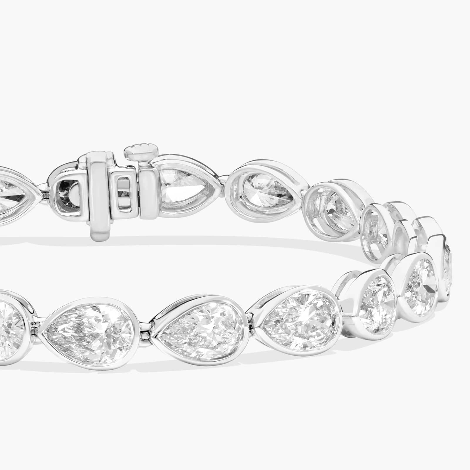 East-West Bezel Tennis Bracelet With 12 CTW Pear Shaped Lab-Grown Diamonds in 14K White Gold