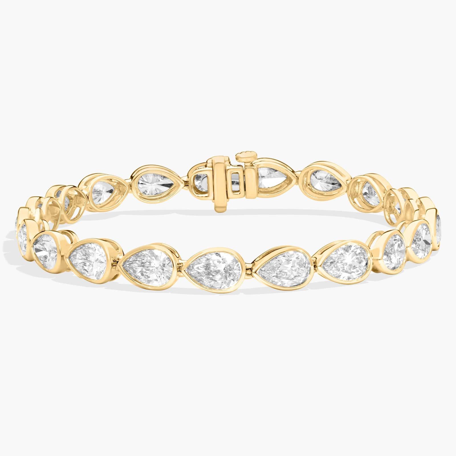 East-West Bezel Tennis Bracelet With 12 CTW Pear Shaped Lab-Grown Diamonds in 14K Yellow Gold