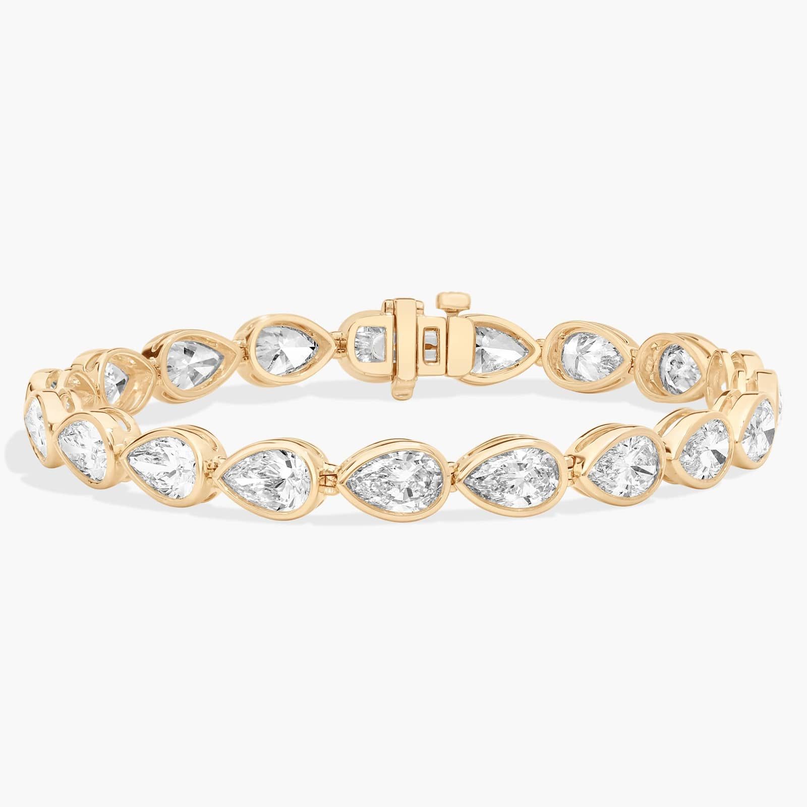 East-West Bezel Tennis Bracelet With 15 CTW Pear Shaped Lab-Grown Diamonds in 14K Yellow Gold