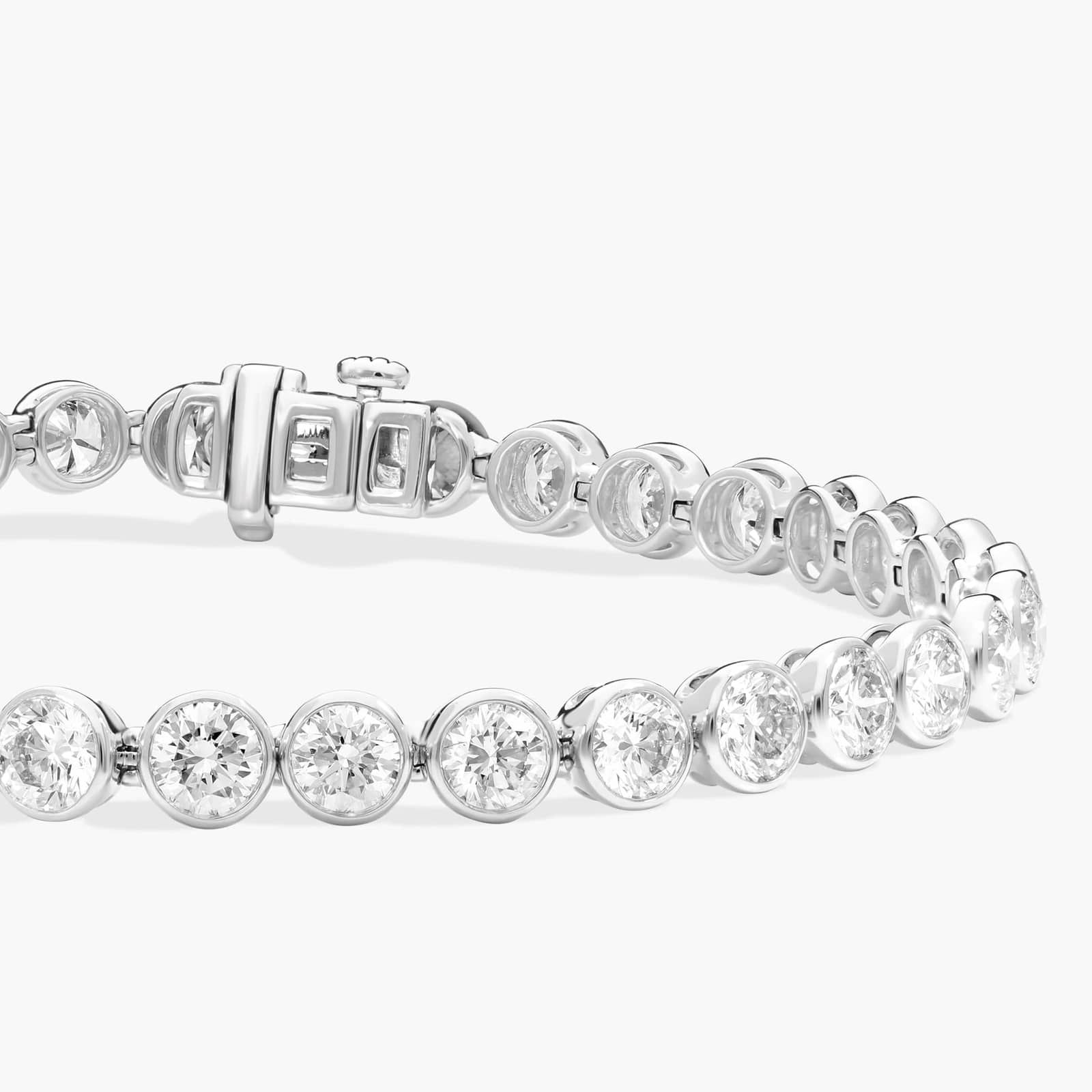 Bezel Tennis Bracelet With 10 CTW Round Diamonds in Platinum