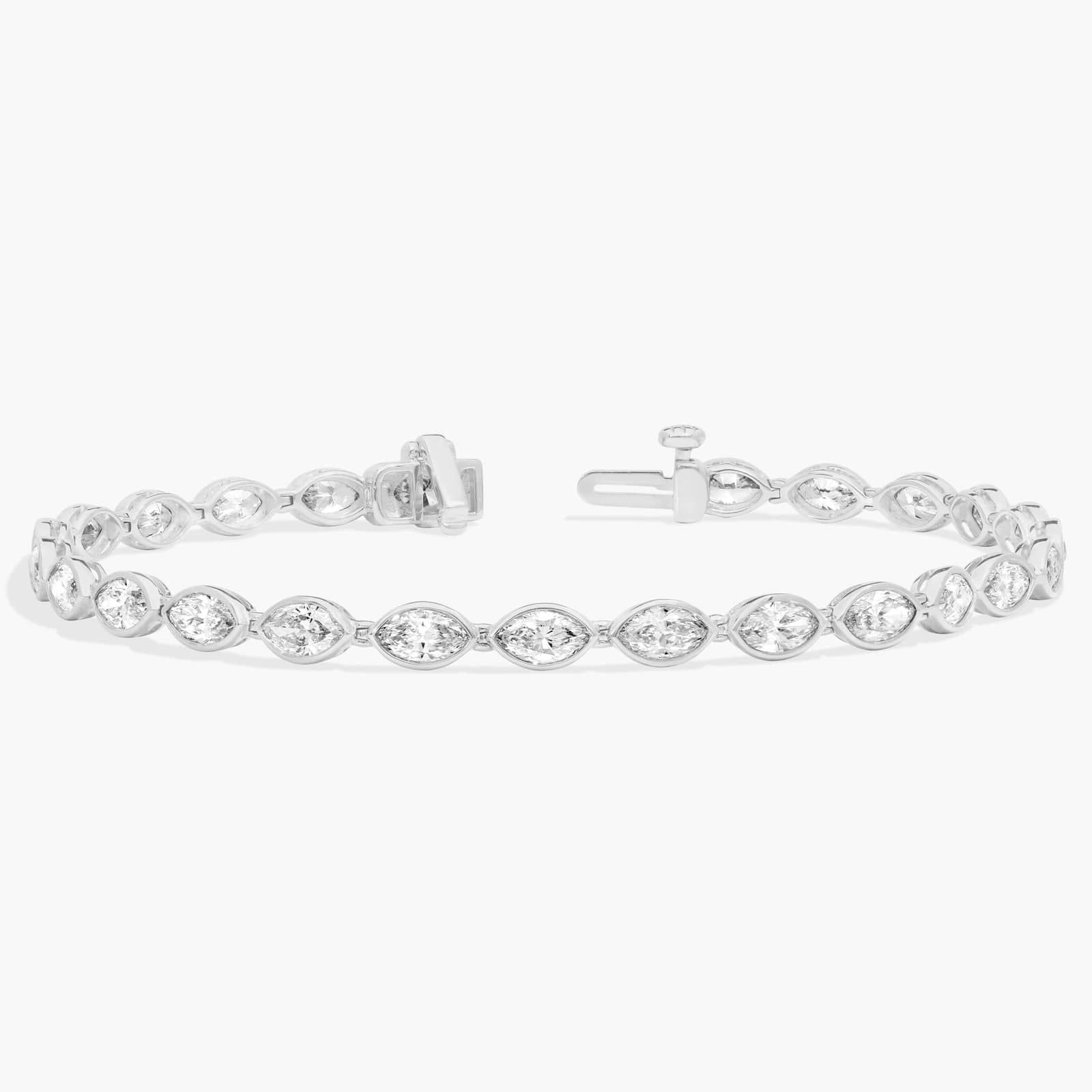 East-West Bezel Tennis Bracelet With 5 CTW Marquise Cut Diamonds in Platinum