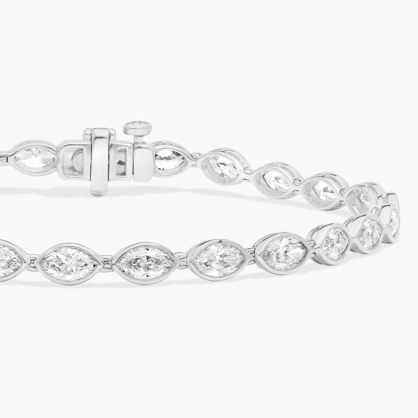East-West Bezel Tennis Bracelet With 5 CTW Marquise Cut Diamonds in Platinum