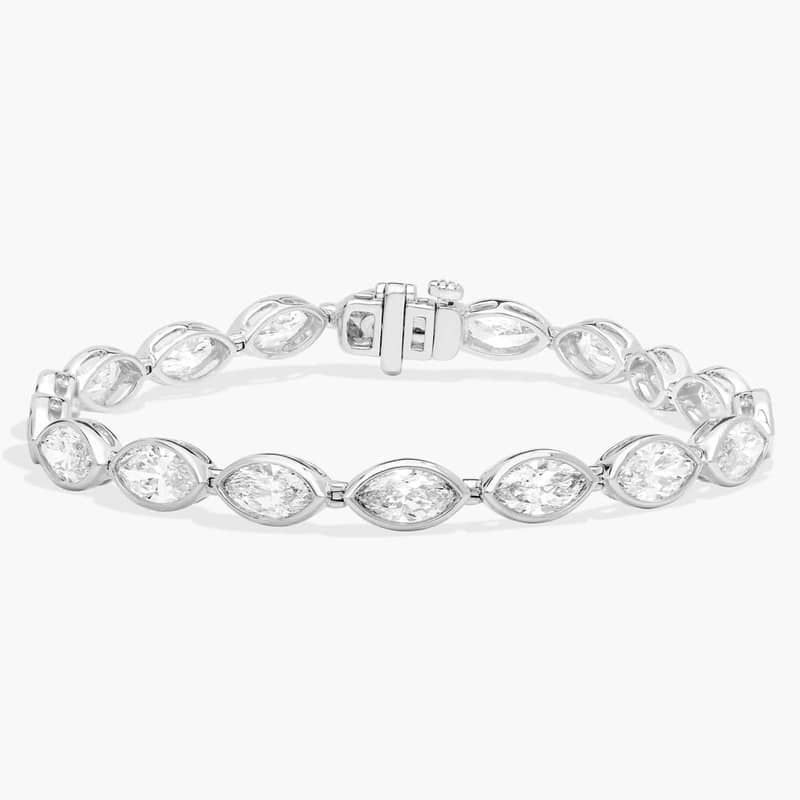 East-West Bezel Tennis Bracelet With 10 CTW Marquise Cut Diamonds in Platinum