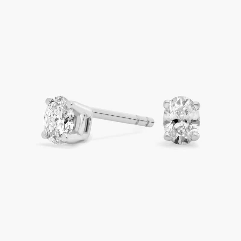 Oval Cut Diamond Stud Earrings in 14k White Gold (1/4 ct. tw.)