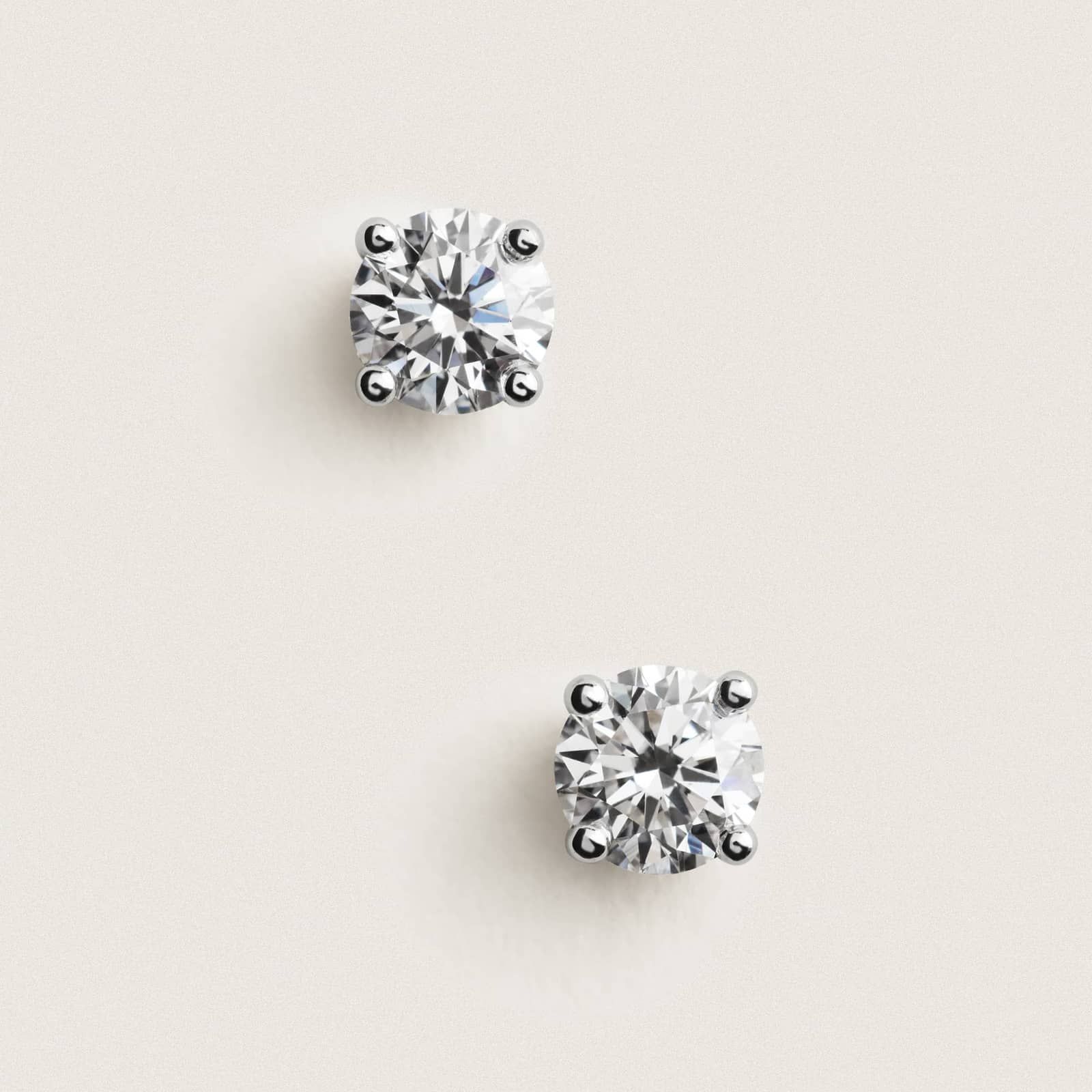 Four Prong Round Brilliant Lab Grown Diamond Stud Earrings in 14k White Gold (0.60 Ct. tw. - F-G / SI1)
