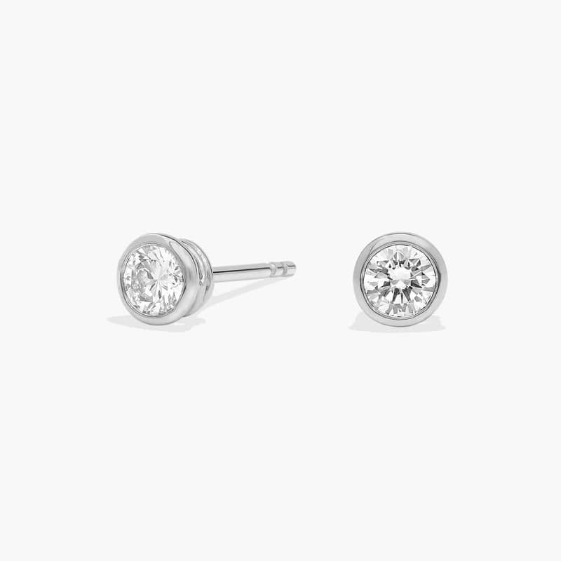 Bezel Set Diamond Stud Earrings In 14K White Gold (1/2 Ct. tw. - H-I / SI1-SI2)