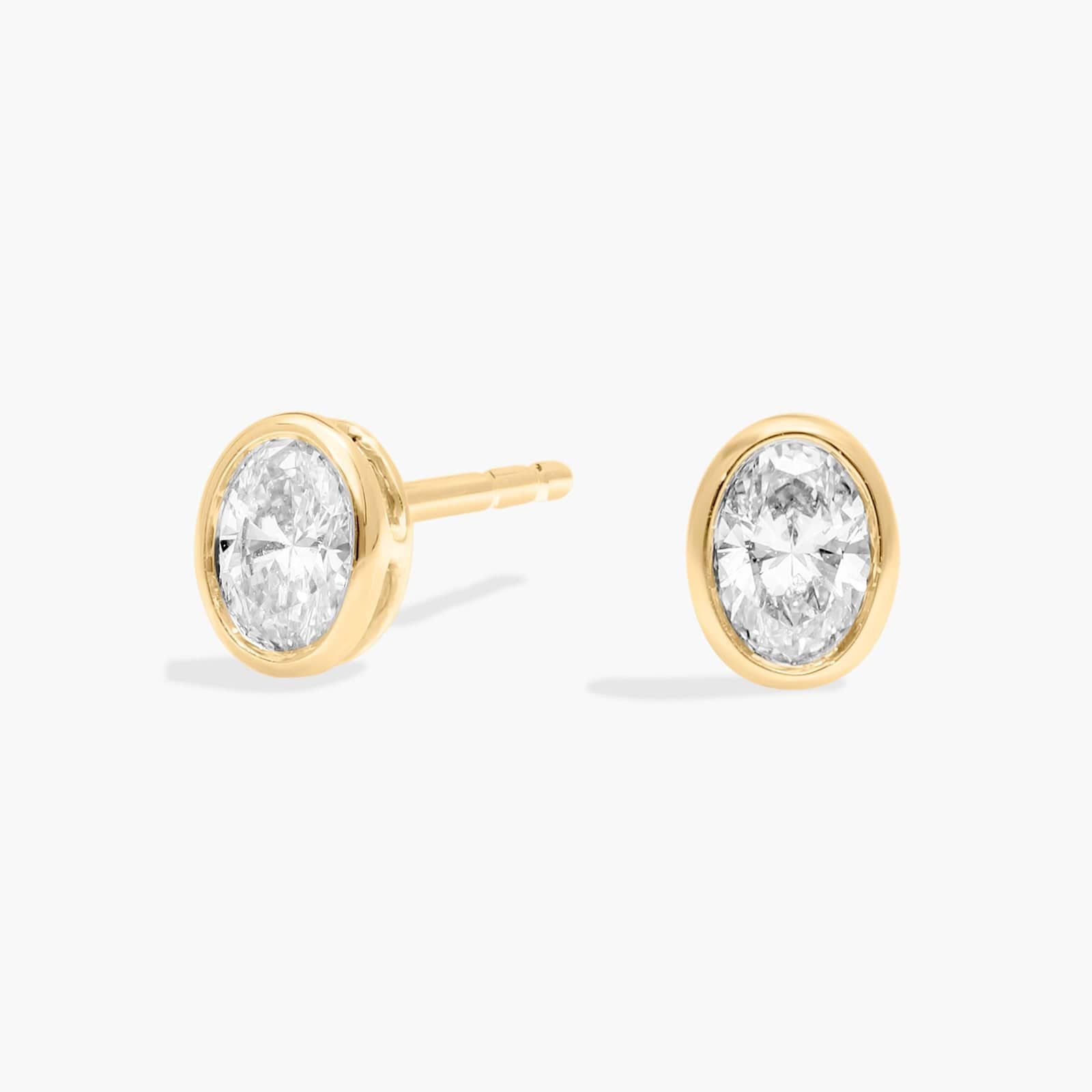 Bezel Stud Earrings With 0.25 CTW Oval Cut Lab-Grown Diamonds in 14K Yellow Gold