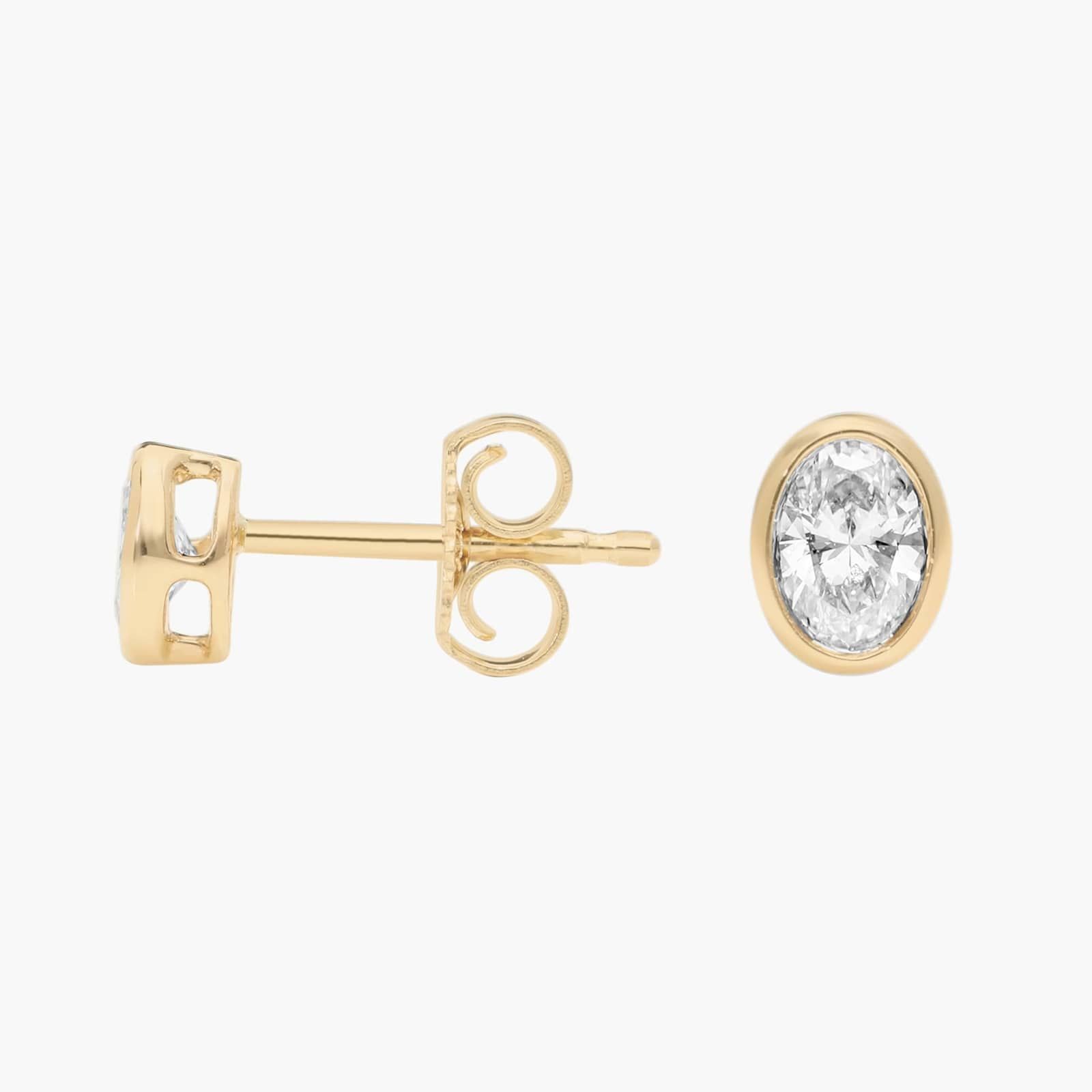 Bezel Stud Earrings With 0.25 CTW Oval Cut Lab-Grown Diamonds in 14K Yellow Gold