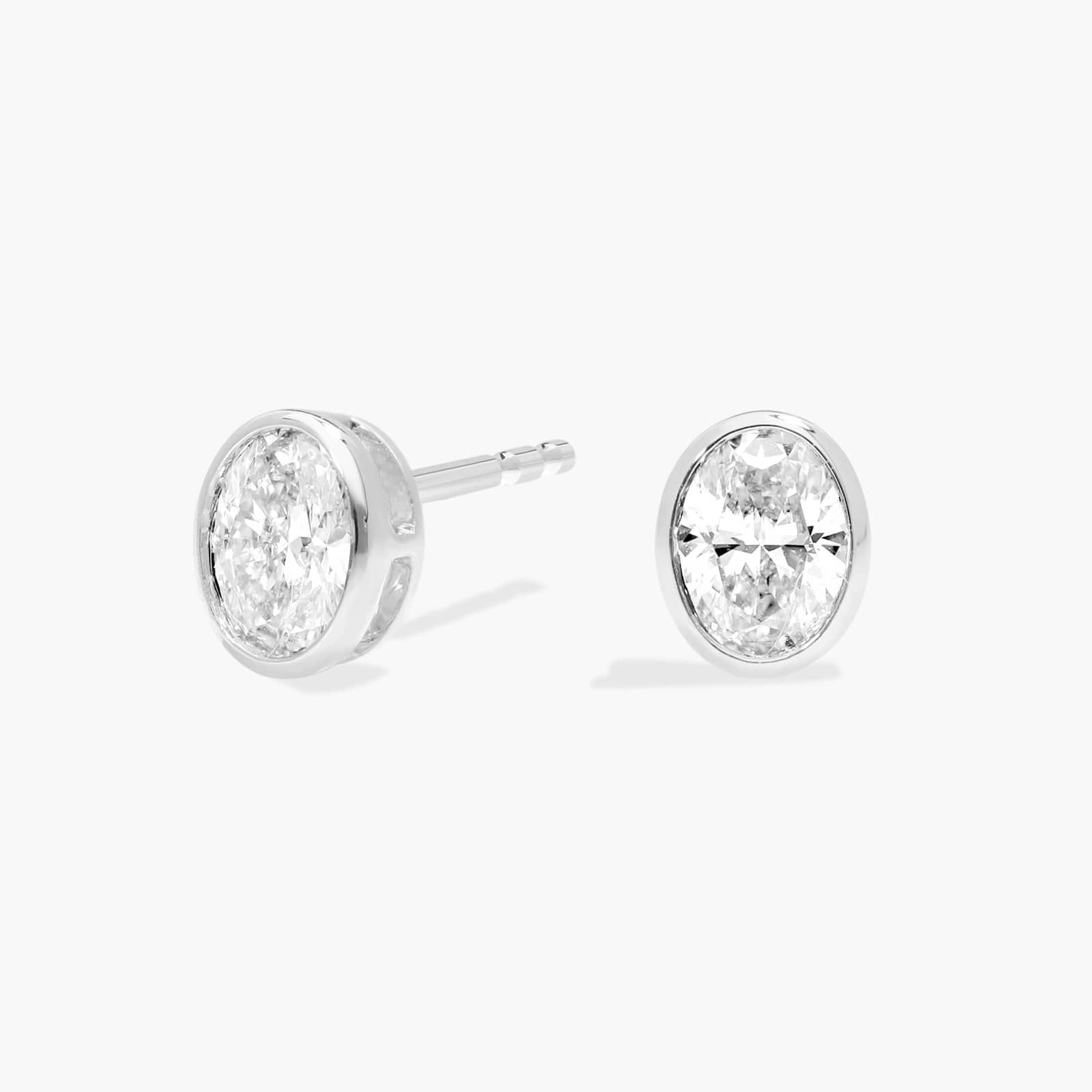 Bezel Stud Earrings With 0.5 CTW Oval Cut Lab-Grown Diamonds in 14K White Gold