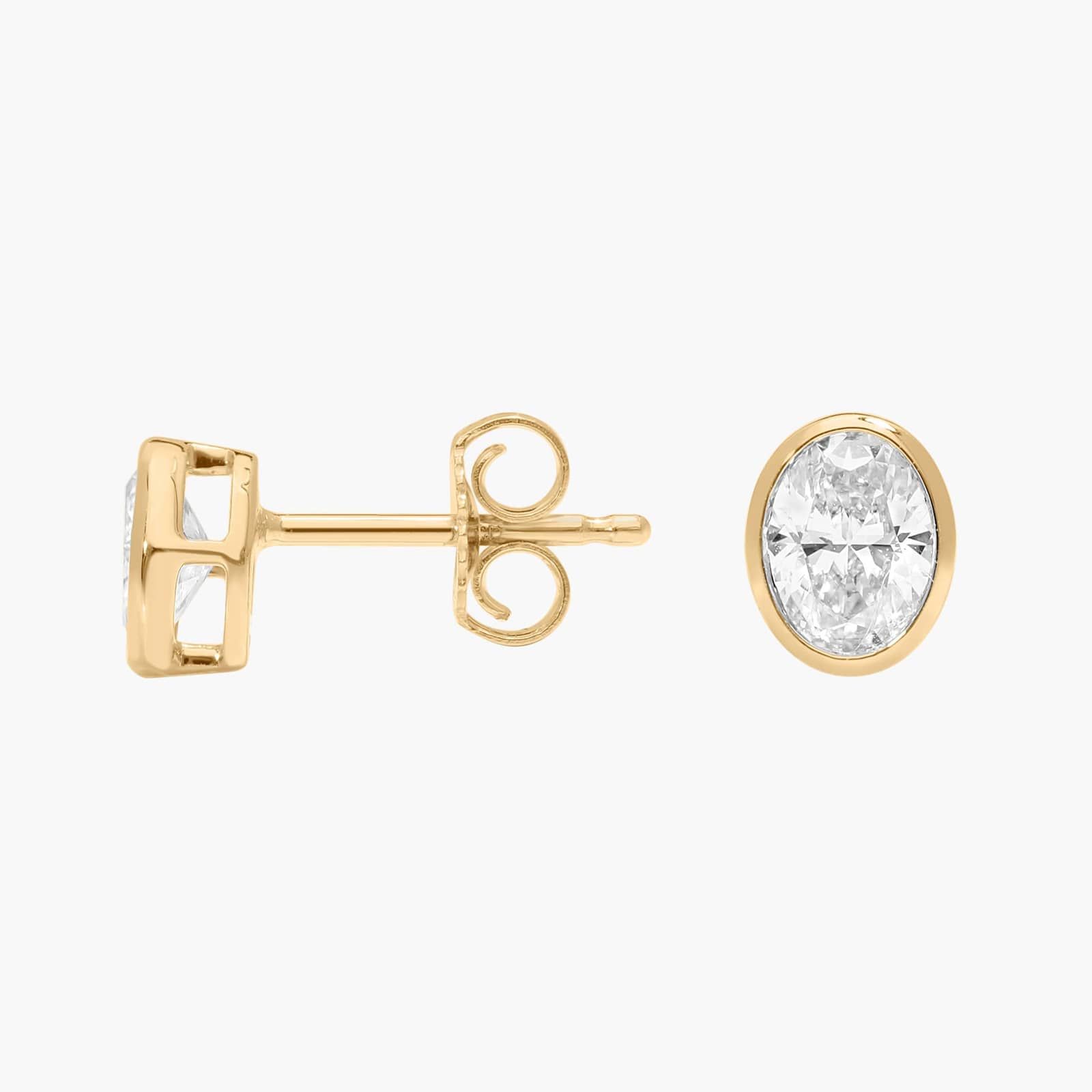 Bezel Stud Earrings With 0.5 CTW Oval Cut Lab-Grown Diamonds in 14K Yellow Gold