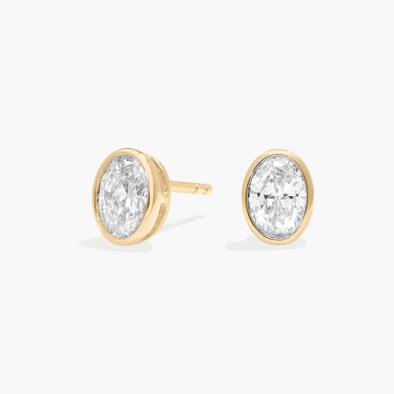 Bezel Diamond Stud Earrings With 1 CTW Oval Cut Diamonds in 14K Yellow Gold