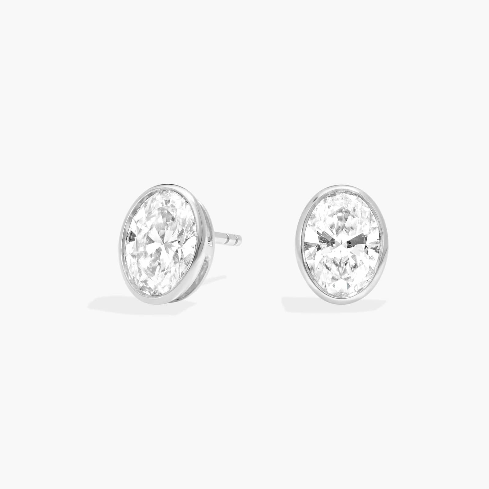Bezel Stud Earrings With 2 CTW Oval Cut Lab-Grown Diamonds in 14K White Gold