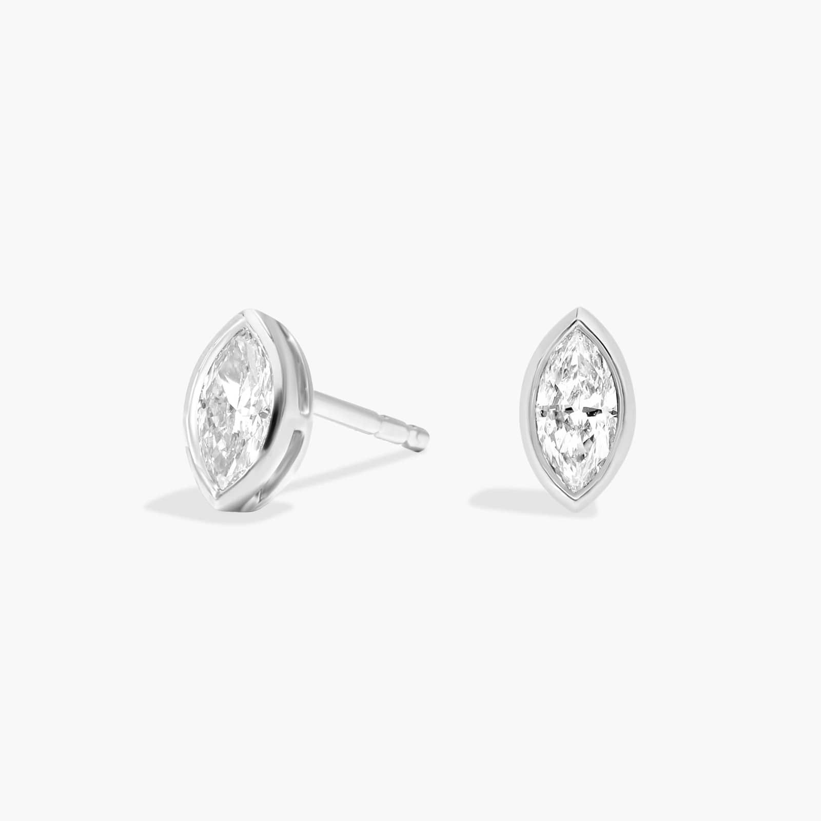Bezel Diamond Stud Earrings With 0.25 CTW Marquise Cut Diamonds in Platinum