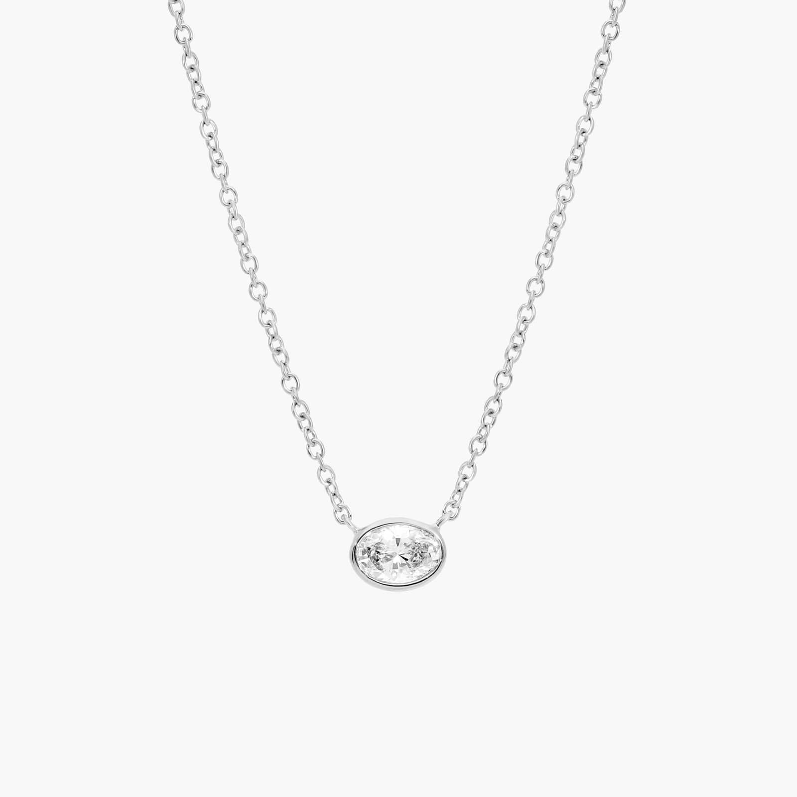 East-West Bezel Solitaire Pendant Necklace With 0.25 CTW Oval Cut Diamond in Platinum