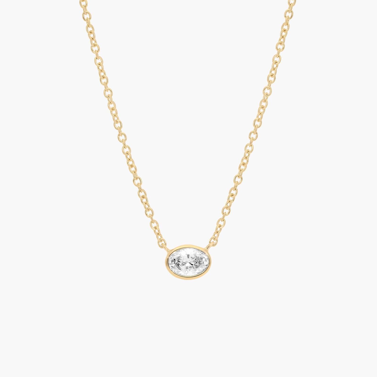 East-West Bezel Solitaire Pendant Necklace With 0.25 CTW Oval Cut Diamond in 14K Yellow Gold
