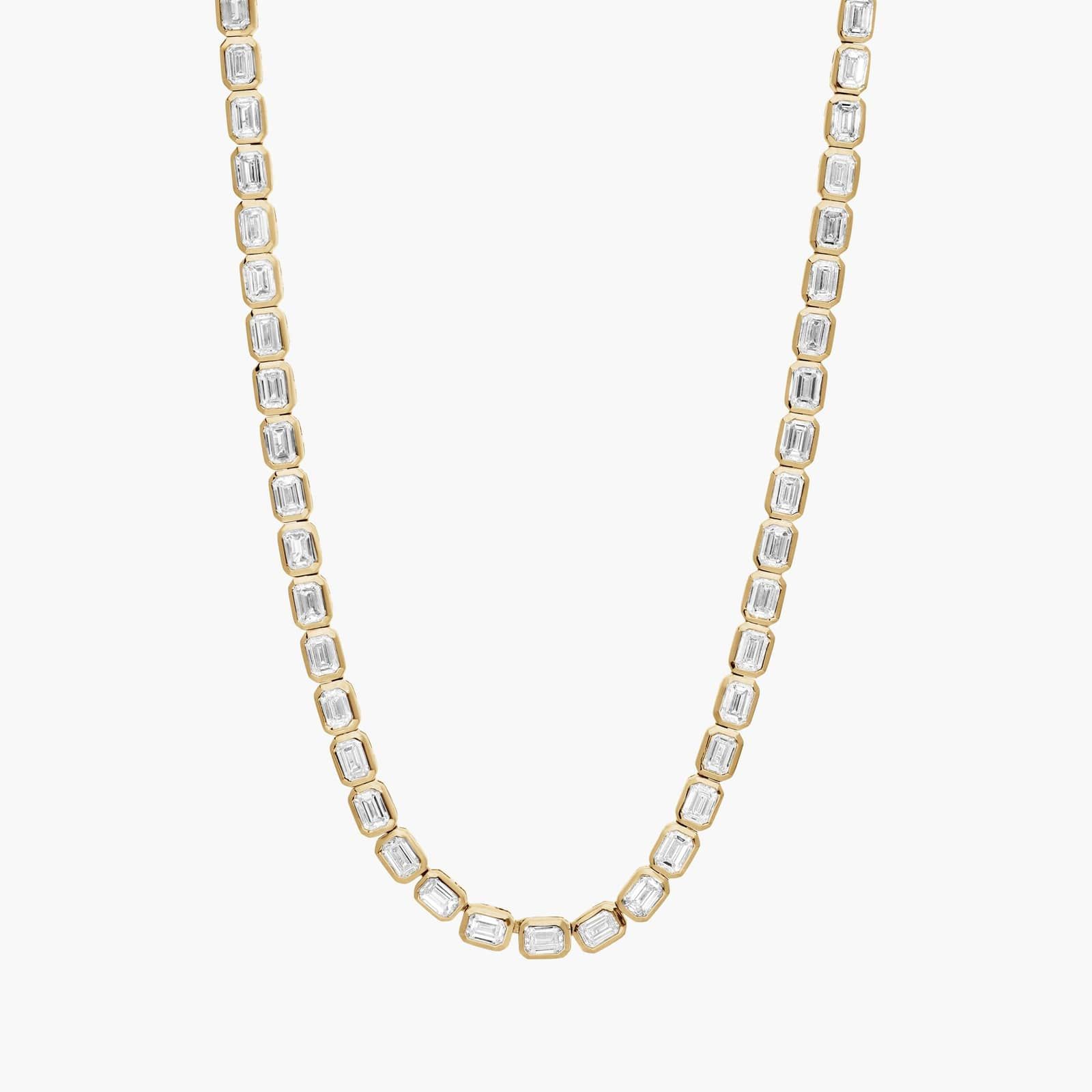 East-West Bezel Tennis Necklace With 10 CTW Emerald Cut Diamonds in 14K Yellow Gold