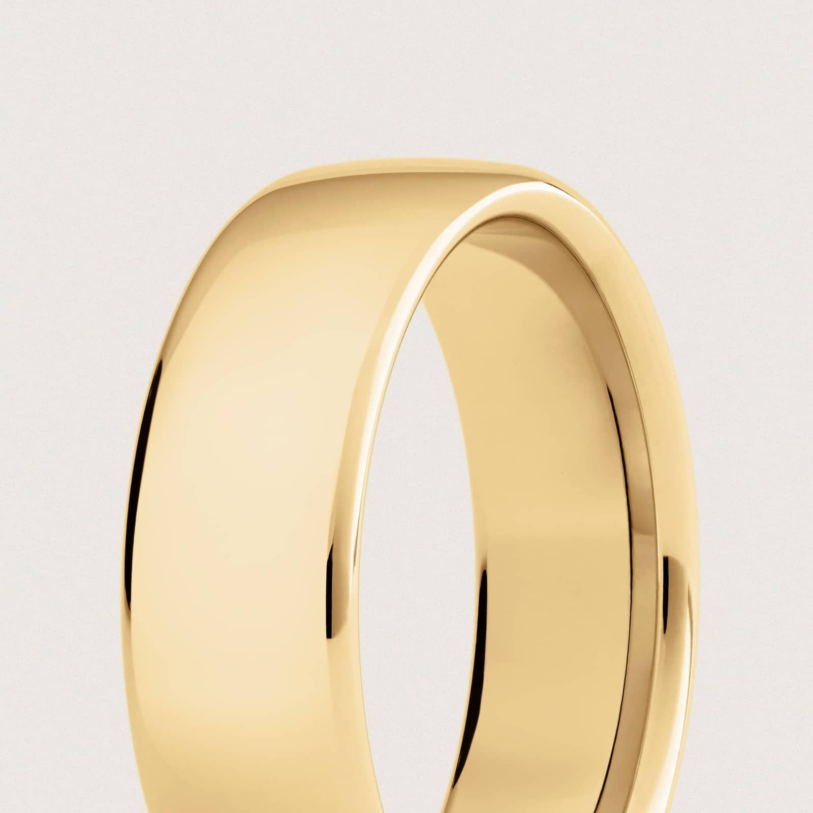 Low Dome Comfort Fit Wedding Ring in 14k Yellow Gold (7mm)