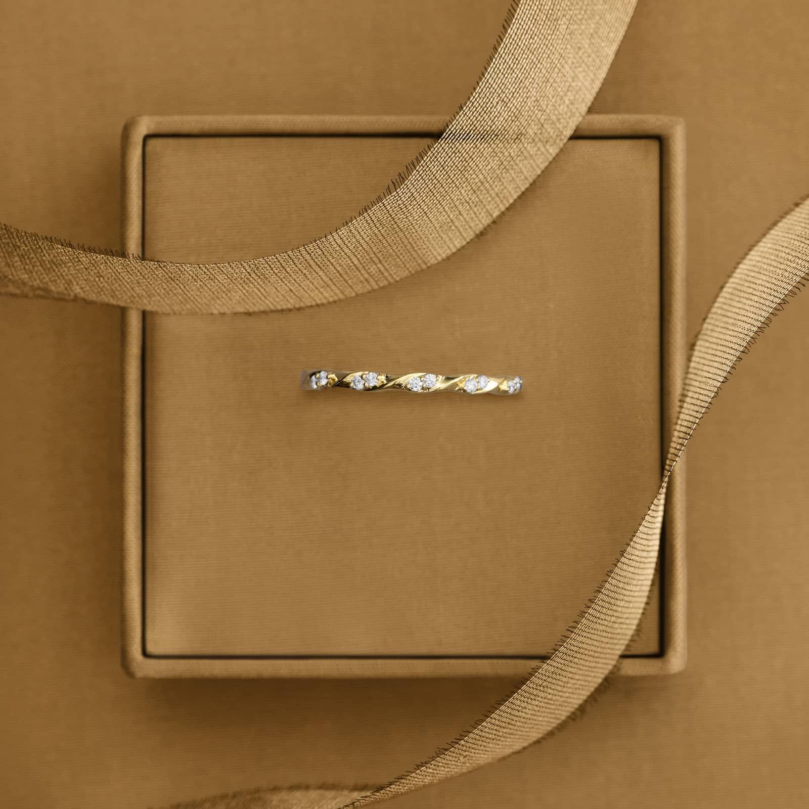 Twisted Diamond Ring in 14K Yellow Gold (1/15 ct. tw.)