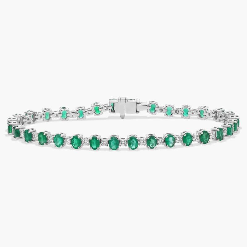 Alternating Diamond and Oval Emerald Tennis Bracelet in 14K White Gold