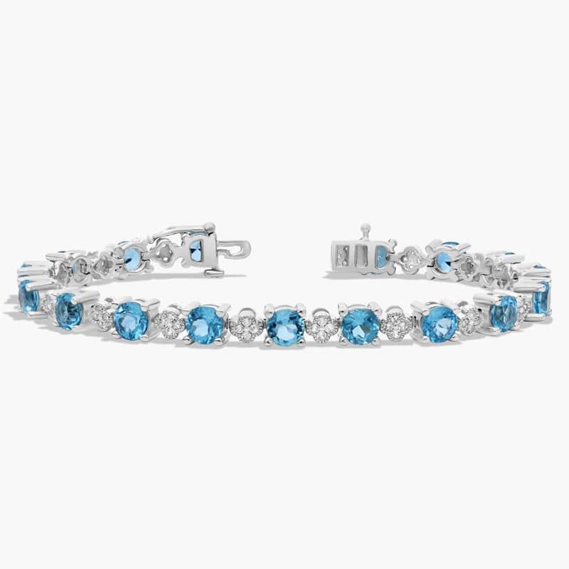 Blue and White Topaz Flower Bracelet in Sterling Silver