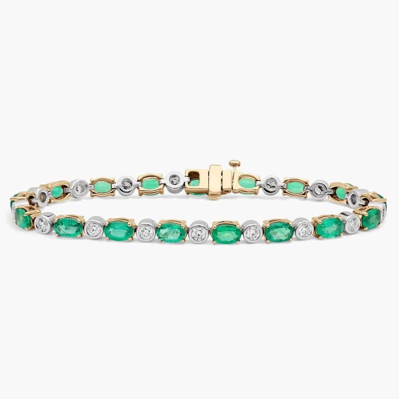 Extraordinary Collection: Two-Toned Oval Emerald and Diamond Tennis Bracelet in 14k Yellow Gold