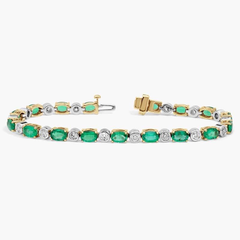 Extraordinary Collection: Two-Toned Oval Emerald and Diamond Tennis Bracelet in 14k Yellow Gold