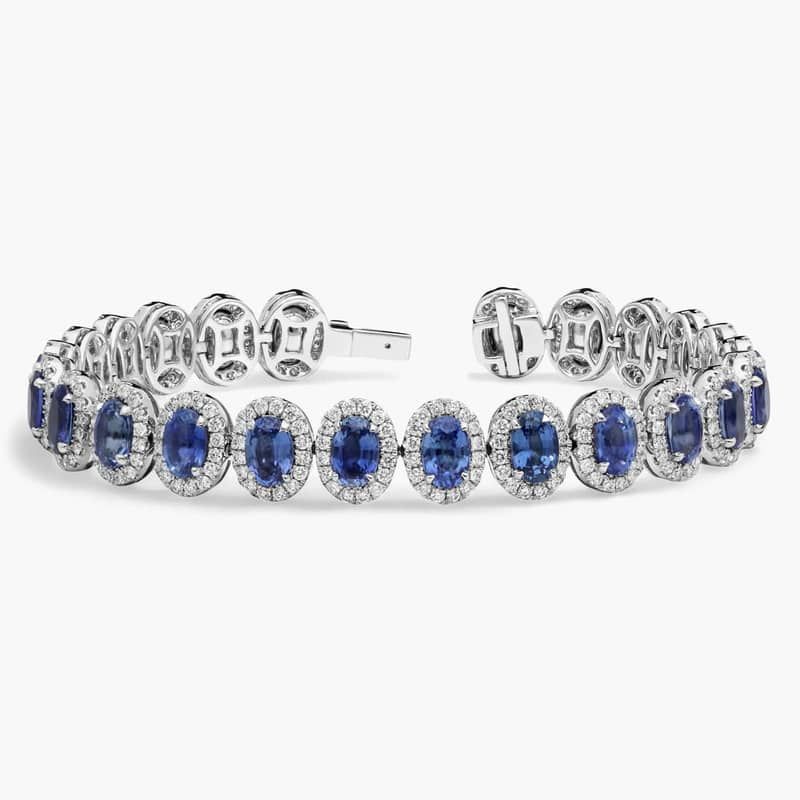 Oval Cut Sapphire & Diamond Halo Bracelet with 3 CTW Round Cut Diamonds in 18K White Gold