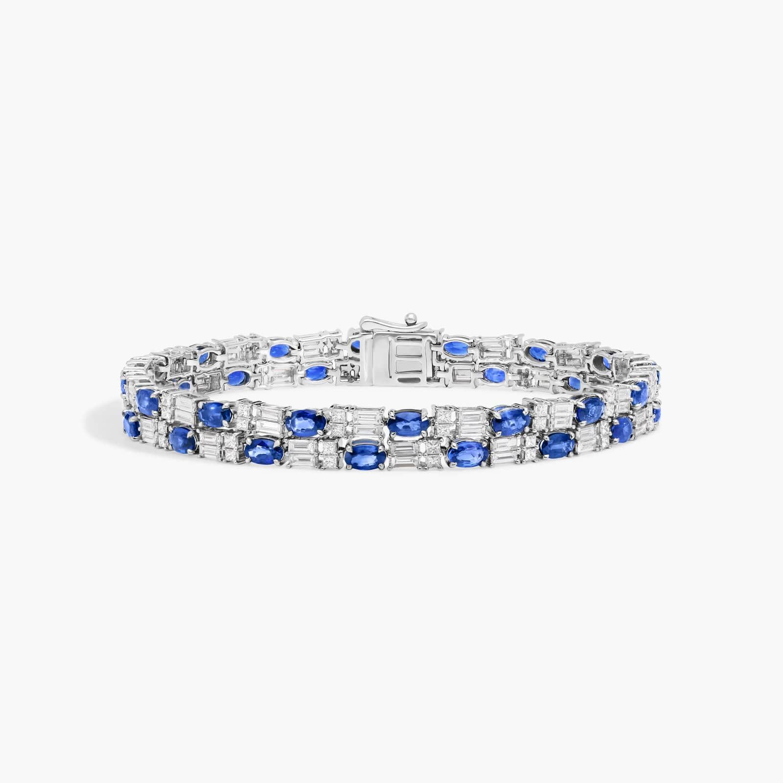 Alternating Baguette Cut Blue Sapphire And Diamond Tennis Bracelet In 14K White Gold