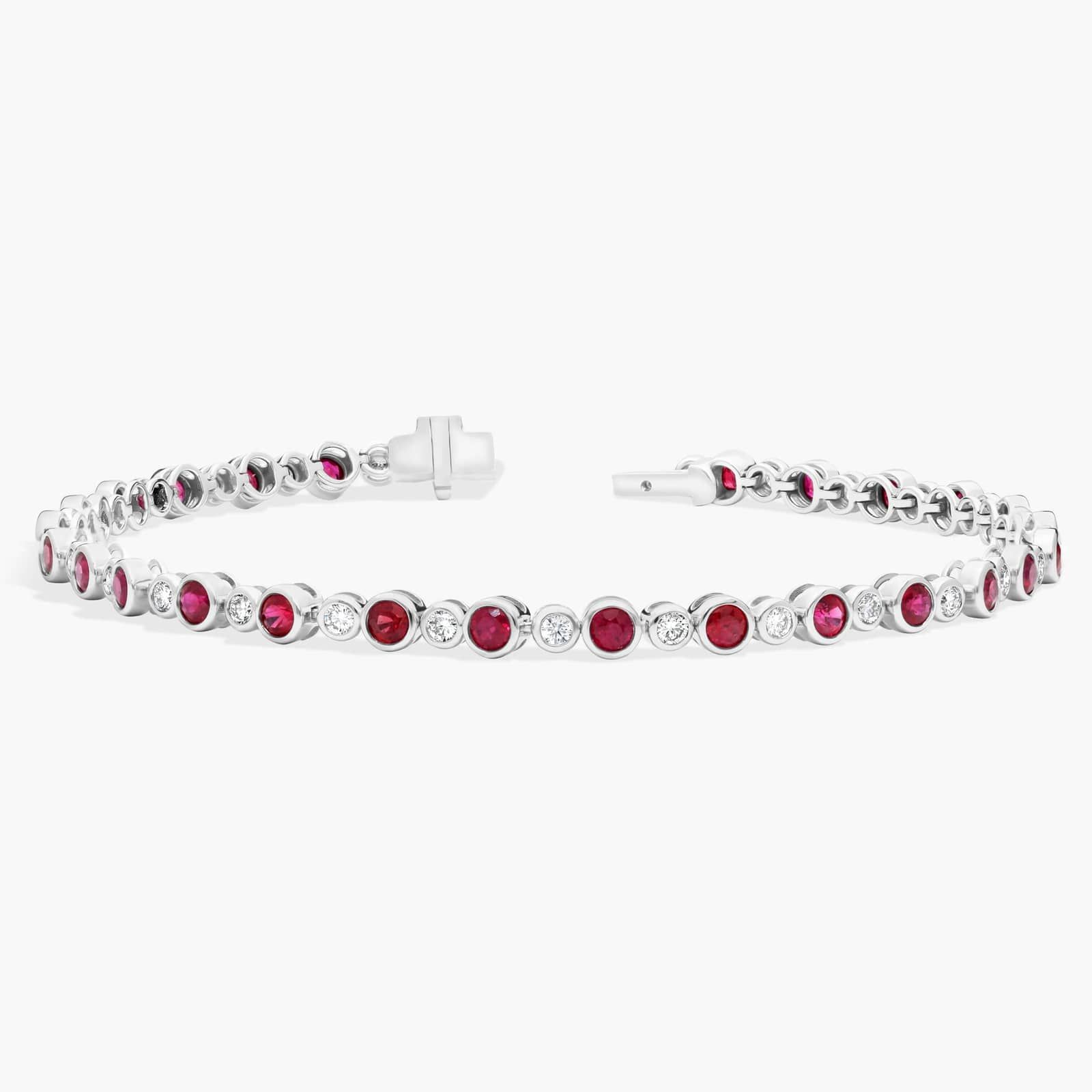 Alternating Ruby and Diamond Bracelet with 0.75 CTW Round Cut Diamonds in 14K White Gold Bezel Setting