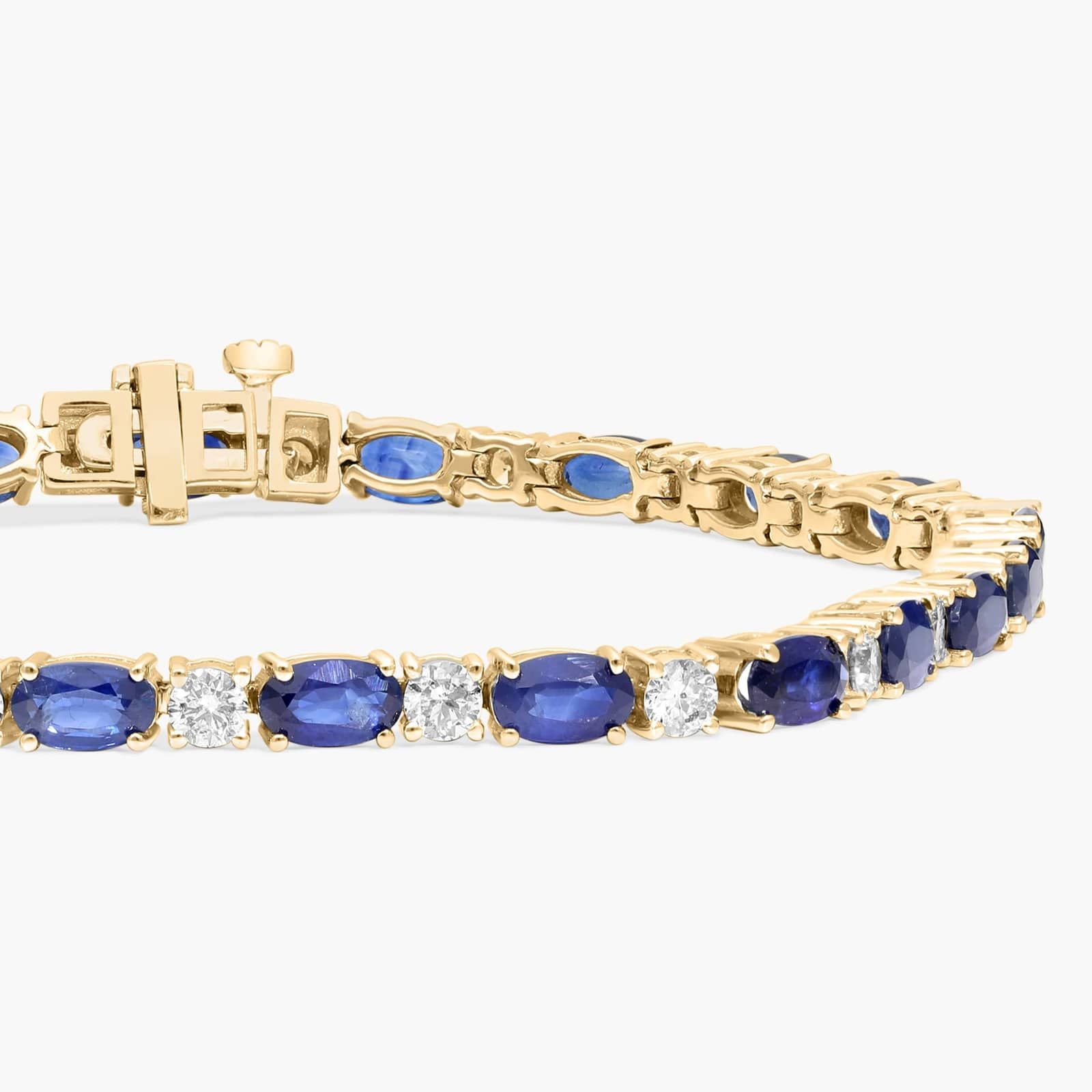 Diamond and Oval Shaped Blue Sapphire Bracelet in 14K Yellow Gold