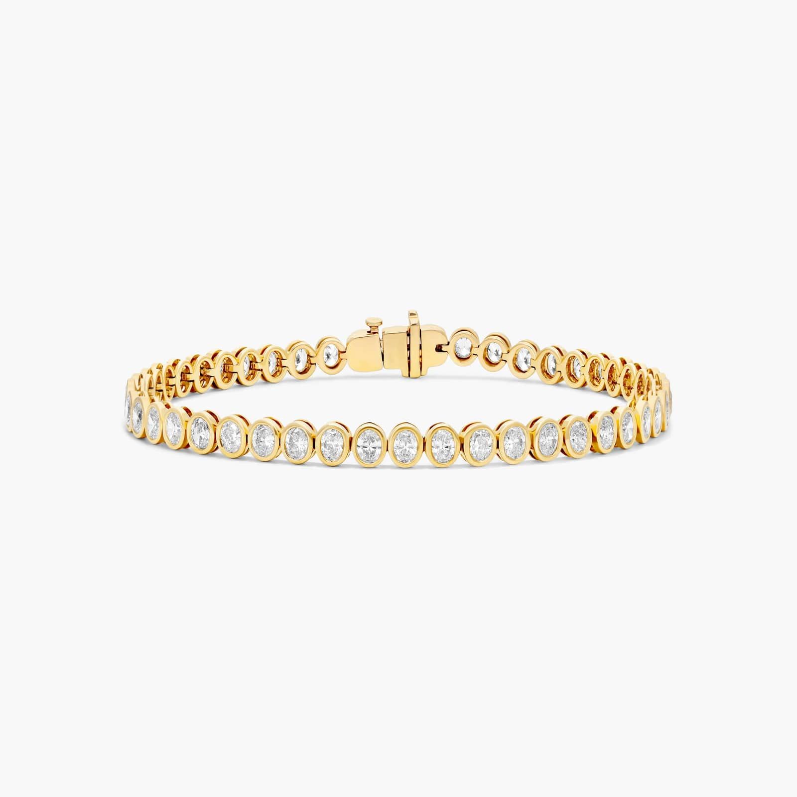 Bezel Tennis Bracelet With Oval Cut Diamonds In 14K Yellow Gold By James Allen