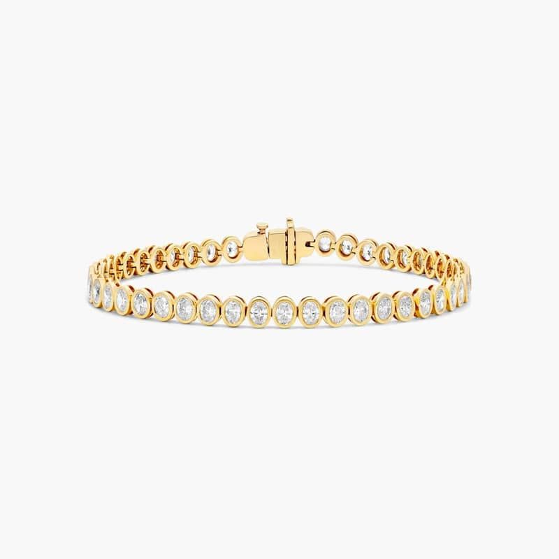 Bezel Tennis Bracelet With Oval Cut Diamonds In 14K Yellow Gold By James Allen