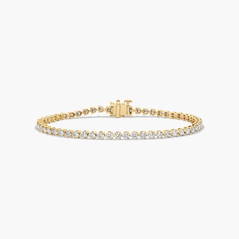 Flower Clasp Tennis Bracelet With 3 CTW Diamonds In 14K Yellow Gold By James Allen