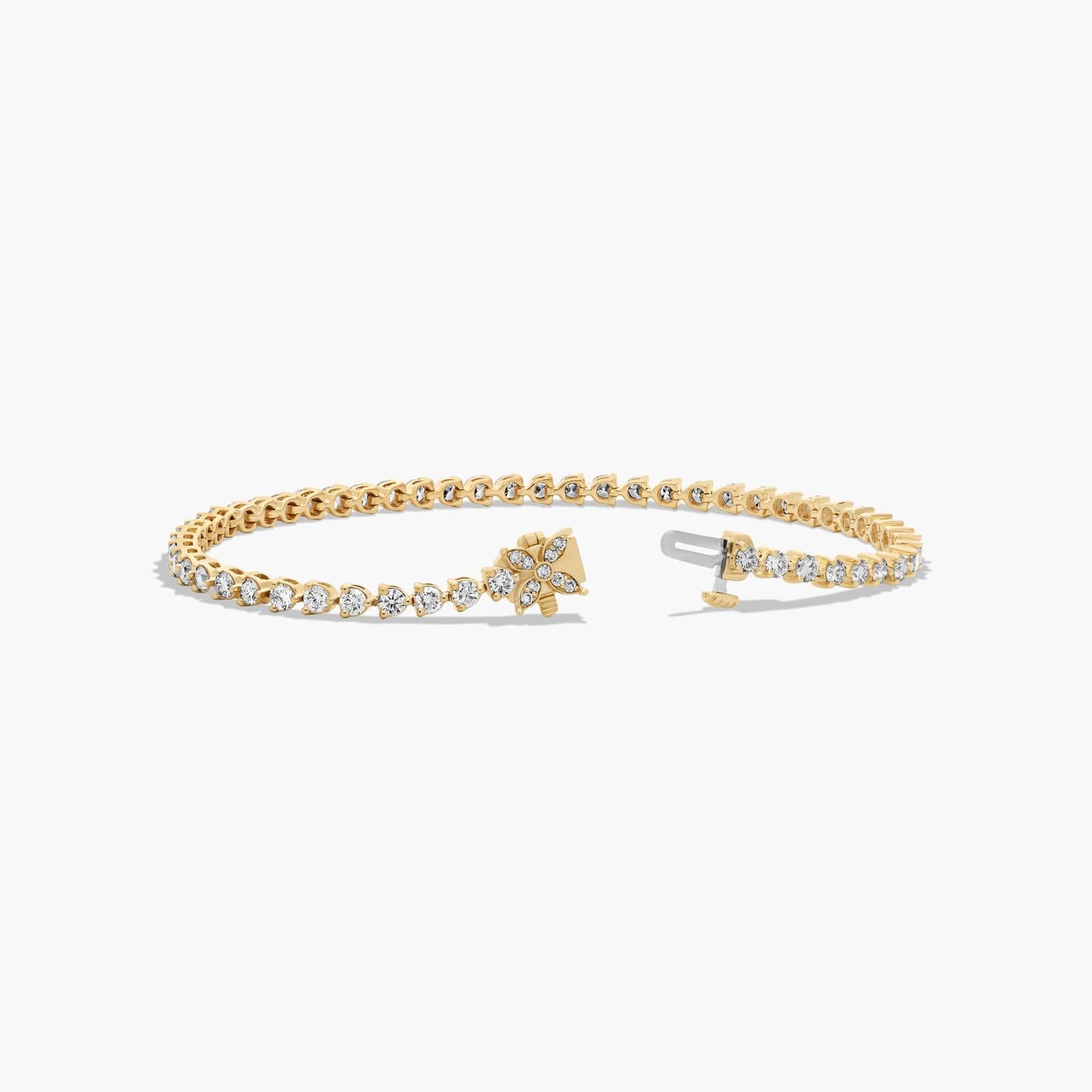 Flower Clasp Tennis Bracelet With 3 CTW Diamonds In 14K Yellow Gold By James Allen
